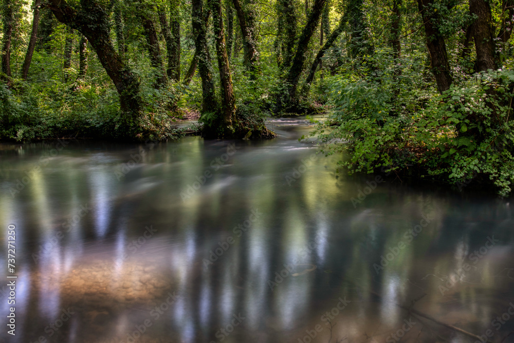 Turquoise color of water in the summer on the river Janj Turquoise color of water in the summer on the river Janj
