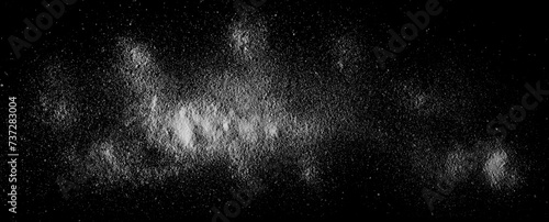 Macro baking soda pile, sodium bicarbonate isolated on black background, top view photo