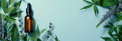 Glass bottle with dropper surrounded by cannabis leaves and buds on a blue background, showcasing CBD oil products. Banner with copy space.