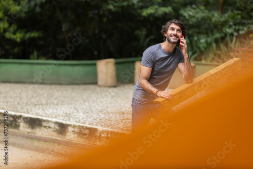 View of a young man with smartphone
