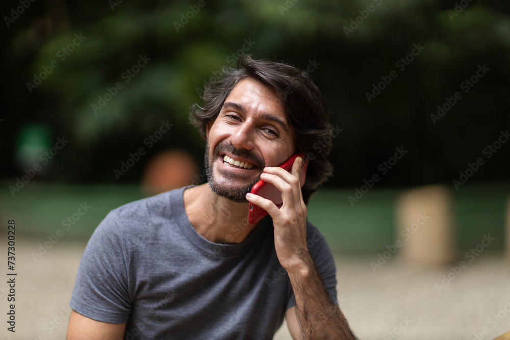 Fototapeta premium View of a young man with smartphone