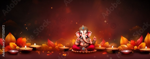 A banner celebrating Diwali with Lord Ganesha, tea lights, Diyas oil lamps with copy space photo