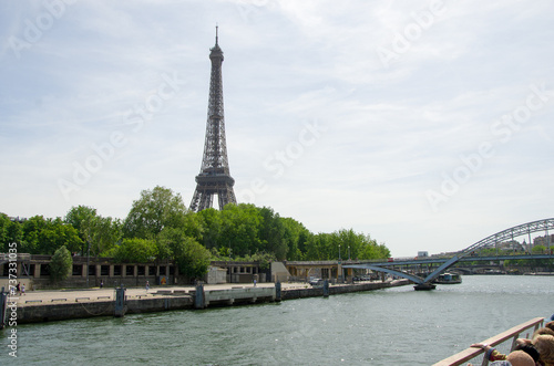 Paris, France, 30 may 2023. Travel in summer on a river boat along the Seine River in the center of city and see the sights, buildings and bridges © ola_pisarenko