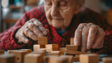 Elderly woman playing with wooden blocks in a geriatric clinic or nursing home