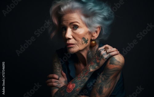 elderly fashion model with tattoos and bright hair 