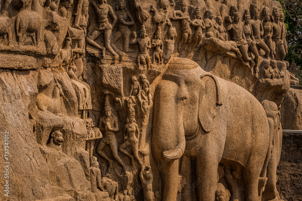 Fototapeta premium Exclusive Monolithic Rock Carved- Arjuna penance is UNESCO's World Heritage Site located at Mamallapuram or Mahabalipuram in Tamil Nadu, Great South India.