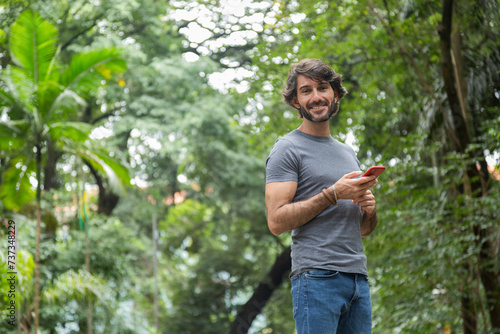 View of a young man with smartphone