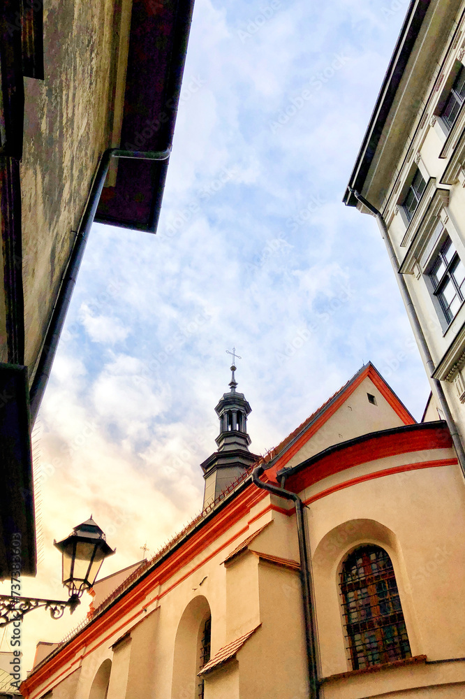 Historical buildings along alleyway in Krakow, Poland Historical buildings along alleyway in Krakow, Poland