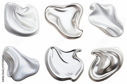 Set of silver melty metallic drops isolated on white background