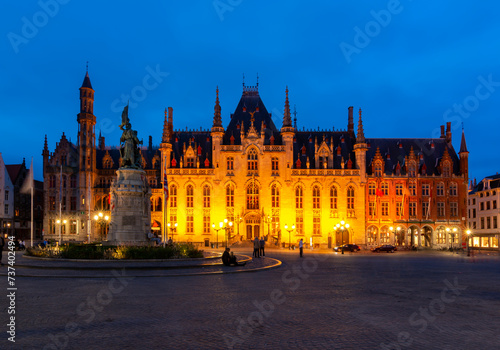 Provincial Court building on Market square (Grote markt) at night, Bruges, Belgium