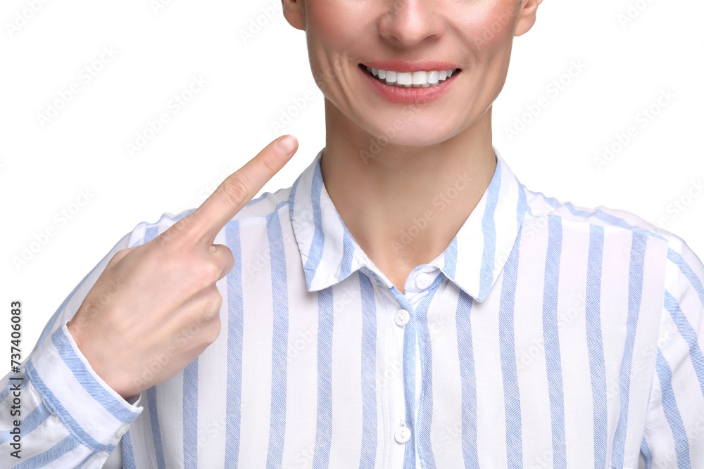 Woman showing her clean teeth and smiling on white background, closeup Woman showing her clean teeth and smiling on white background, closeup