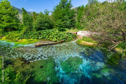 The Blue Eye natural water pool, in southern Albania is formed by an underground river that emerges from a depth of over 50 meters or 164 feet and creates a beautiful circular pool. Aerial view