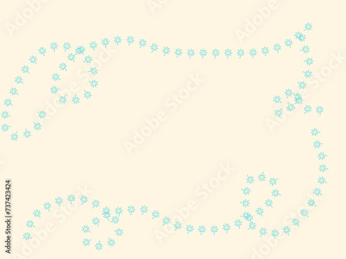 Light tan background with blue leaf around the edge free space . High quality photo