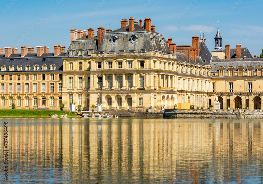 Fontainebleau palace (Chateau de Fontainebleau) and Carp's pond near Paris, France