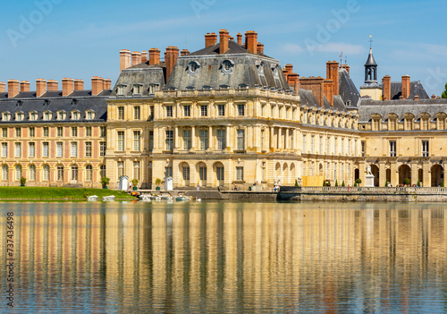 Fontainebleau palace (Chateau de Fontainebleau) and Carp's pond near Paris, France