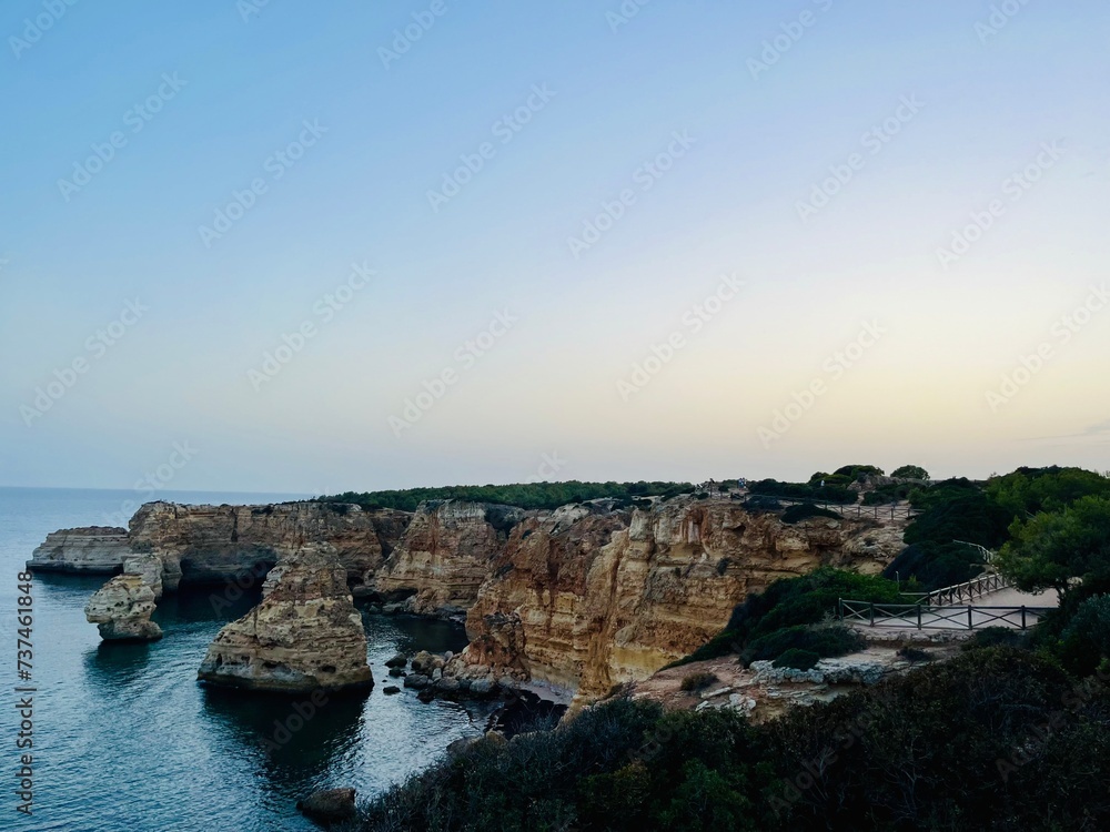ocean rocky coast, cliff, evening time, idyllic ocean rocky coast, cliff, evening time, idyllic