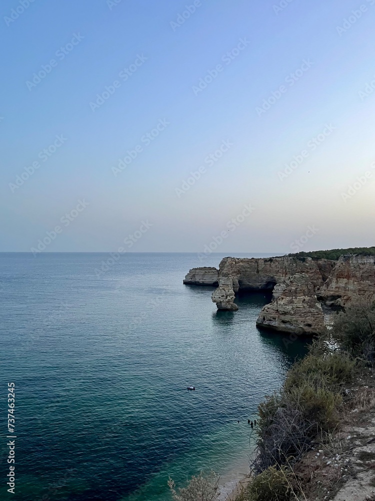 ocean rocky coast, cliff, evening time, idyllic ocean rocky coast, cliff, evening time, idyllic
