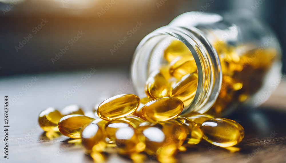 Bright yellow fish oil capsules or vitamin D capsules on a soft surface, symbolizing health and wellness at home Bright yellow fish oil capsules or vitamin D capsules on a soft surface, symbolizing health and wellness at home