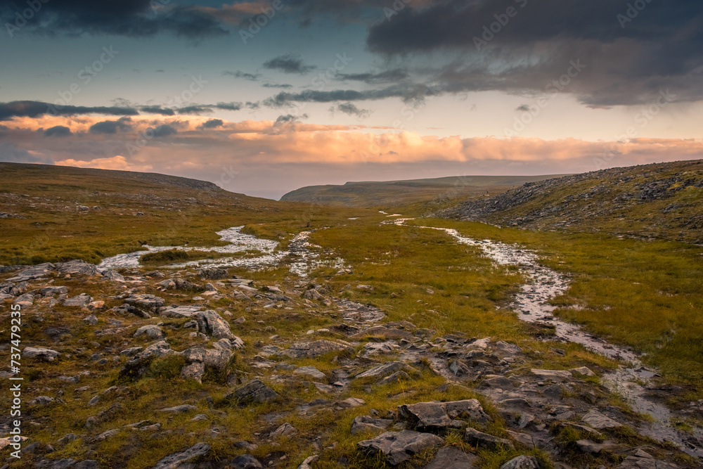Knivskjellodden, a trail in the tundra towards the true northernmost point of Europe, Norway Knivskjellodden, a trail in the tundra towards the true northernmost point of Europe, Norway