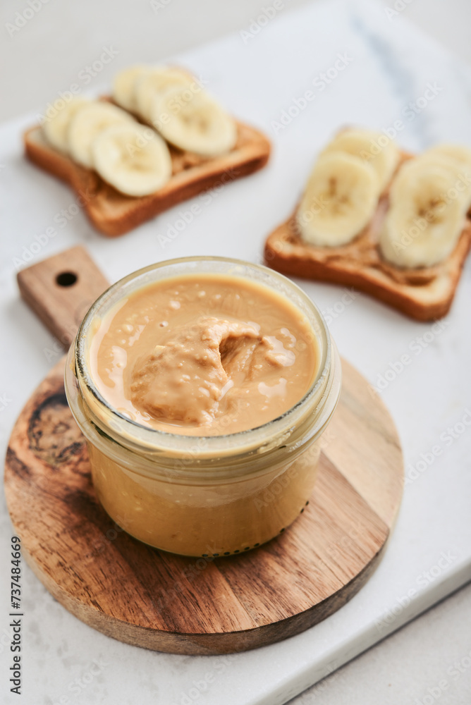 Creamy and smooth peanut butter in jar