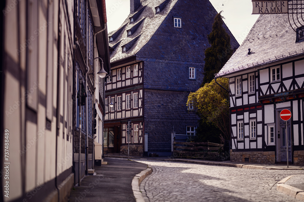 Fototapeta premium Peaceful Cobblestone Street in Traditional European Old Town