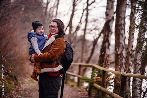 Joyful Father-Son Bonding on a Forest Trail Hike