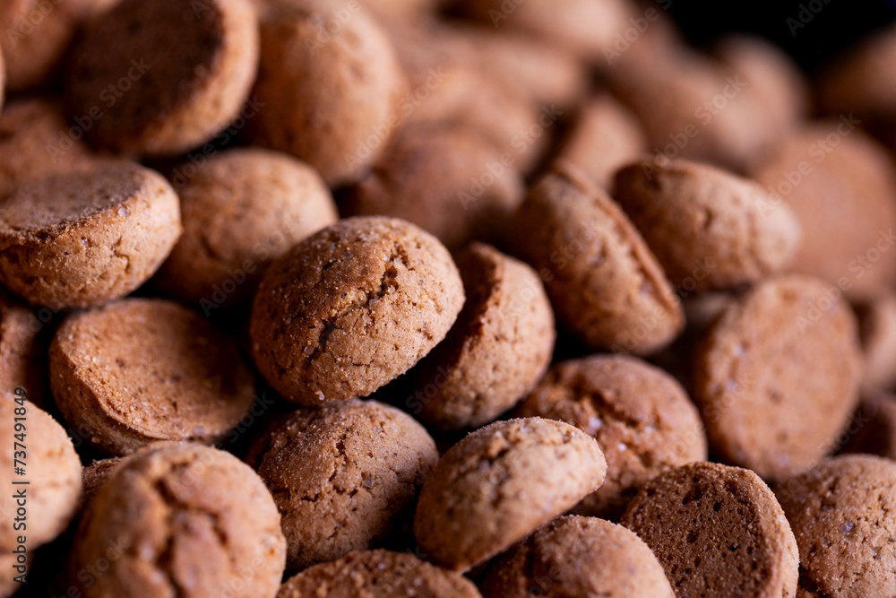 A portrait of a delicious dutch treat called pepernoten. Pepper nuts are a traditional cookie during holidays and saint nicholas or sinterklaas in dutch and it tastes like gingerbread. A portrait of a delicious dutch treat called pepernoten. Pepper nuts are a traditional cookie during holidays and saint nicholas or sinterklaas in dutch and it tastes like gingerbread.