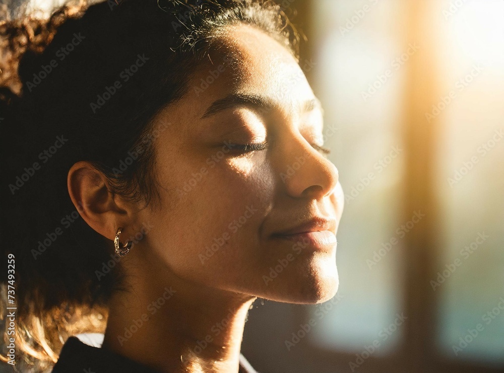 Serene Latin Woman in Sunlit Room Practicing Mindfulness. A tranquil image woman with closed eyes, basking in sunlight, exuding peace and relaxation through breathwork or meditation,