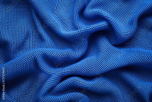 Fabric texture of a blue football jersey photo