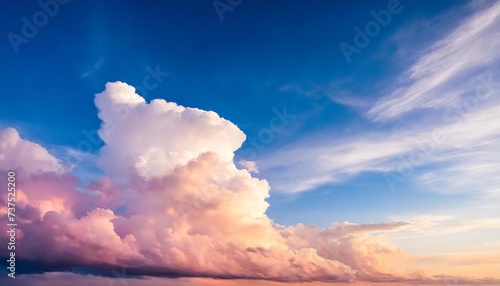 blue sky background with white and pink clouds at sunset