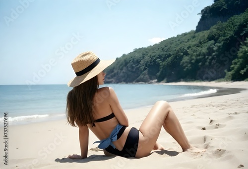 woman with hat on the beach © JazzRock