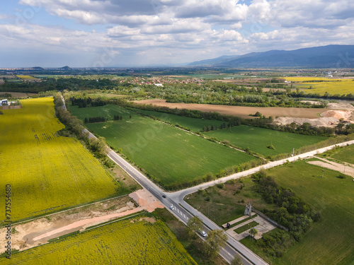 Blooming rapeseed field near village of Kostievo, Bulgaria photo