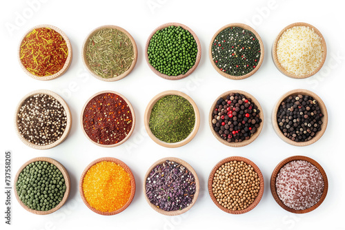 A vibrant display of various spices, neatly arranged in wooden bowls, showcasing a rich diversity of colors and textures on a white background.