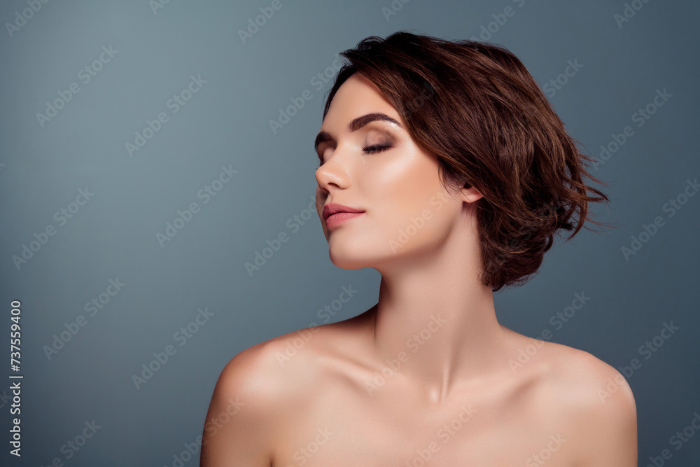 Photo portrait of lovely young lady closed eyes enjoy spa treatment shoulders off isolated on gray color background Photo portrait of lovely young lady closed eyes enjoy spa treatment shoulders off isolated on gray color background