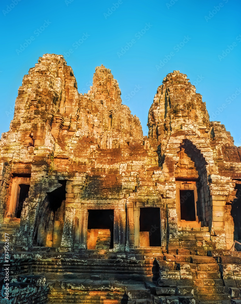 Fototapeta premium Stone ruins of the Bayon temple, Angkor Wat, Cambodia