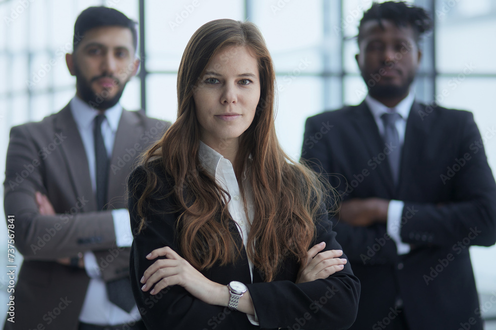 Successful diverse business team, three workers looking at camera Successful diverse business team, three workers looking at camera