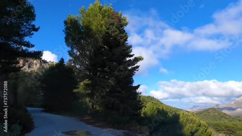 Road from Puerto Saucillo,Sierra de las Nieves national park, Andalusia, Spain. Time lapse series. photo