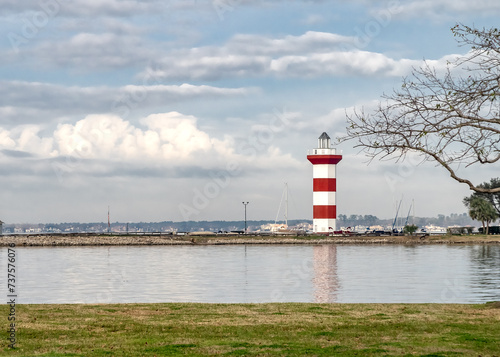 Lighthouse on Lake Conroe with clouds in background