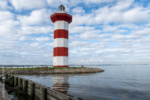 Lighthouse on Lake Conroe with clouds in background