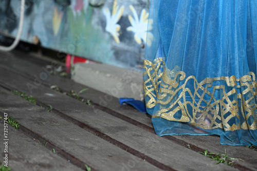фотографія princess dress hem, dress hem, blue dress, golden detail