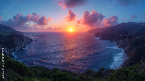 the sun is setting over the ocean with a mountain range in the foreground and a body of water in the foreground.