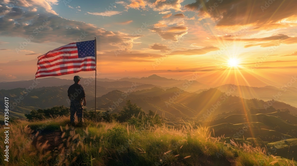 American soldier on a hill next to the American flag in a sunny or sunset setting