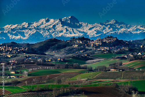 Fototapeta Naklejka Na Ścianę i Meble -  A postcard from Monferrato with a view of the snow-capped Alps - Camagna - Alessandria - Piedmont - Italy