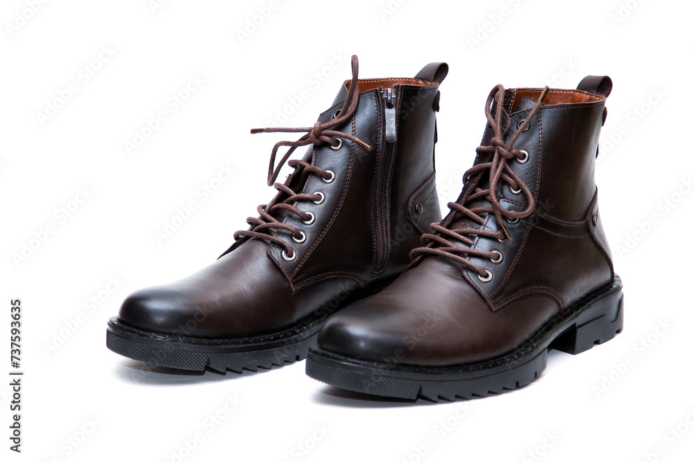 Brown leather boots on white background

