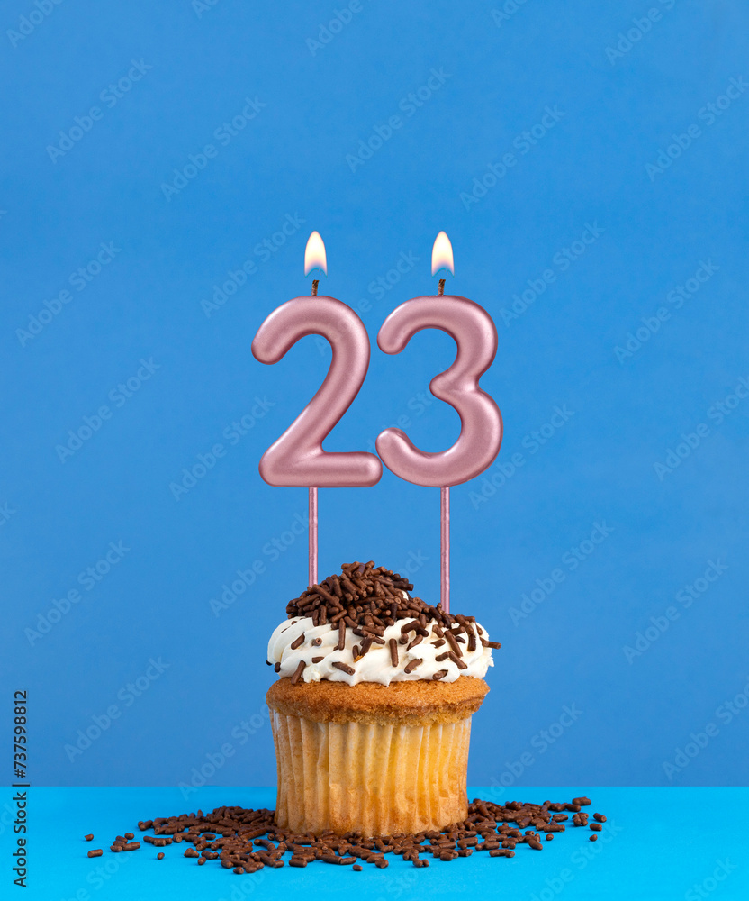 Candle number 23 - Birthday card with cupcake on blue background