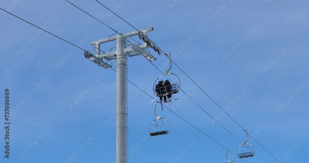 chair lift againts the blue sky , Savoie department, France chair lift againts the blue sky , Savoie department, France