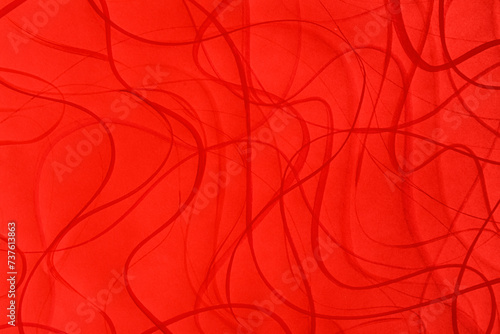 Closeup view of abstract red material as background photo