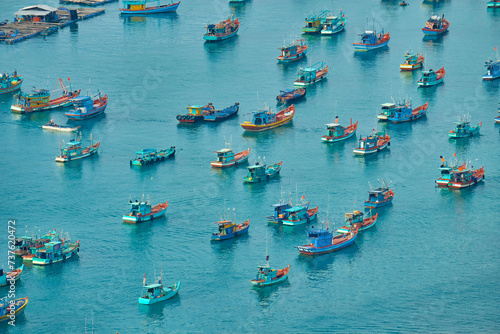 Aerial view from the cable car to the national Vietnamese wooden fishing boats on sea An Thoi harbor. Phu Quoc island, Vietnam.