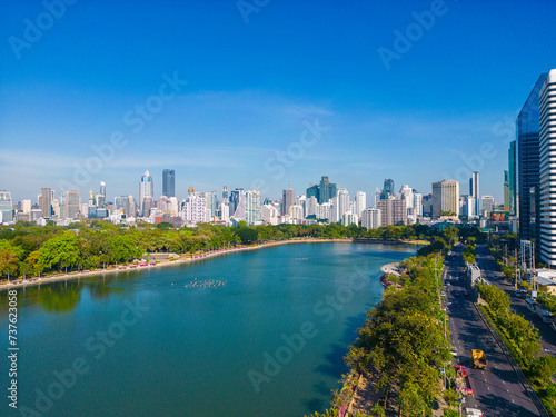 Aerial view modern office building with tropical green tree park in Benchakitti public park downtown