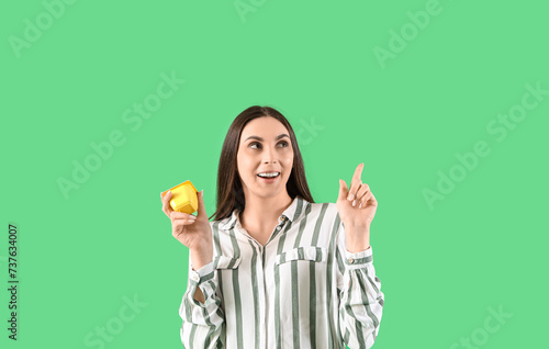 Young woman with tasty yogh...